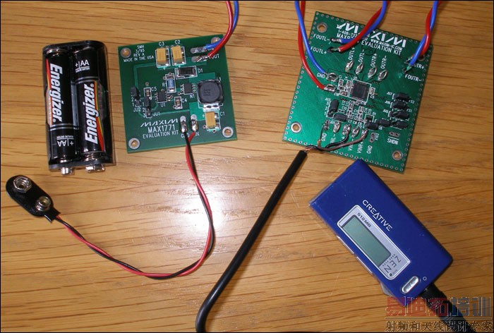 Figure 1. Powered by a switching converter operating from two AA cells, this Class D amplifier (right-hand board) delivers 6W of speaker power for as long as four hours.